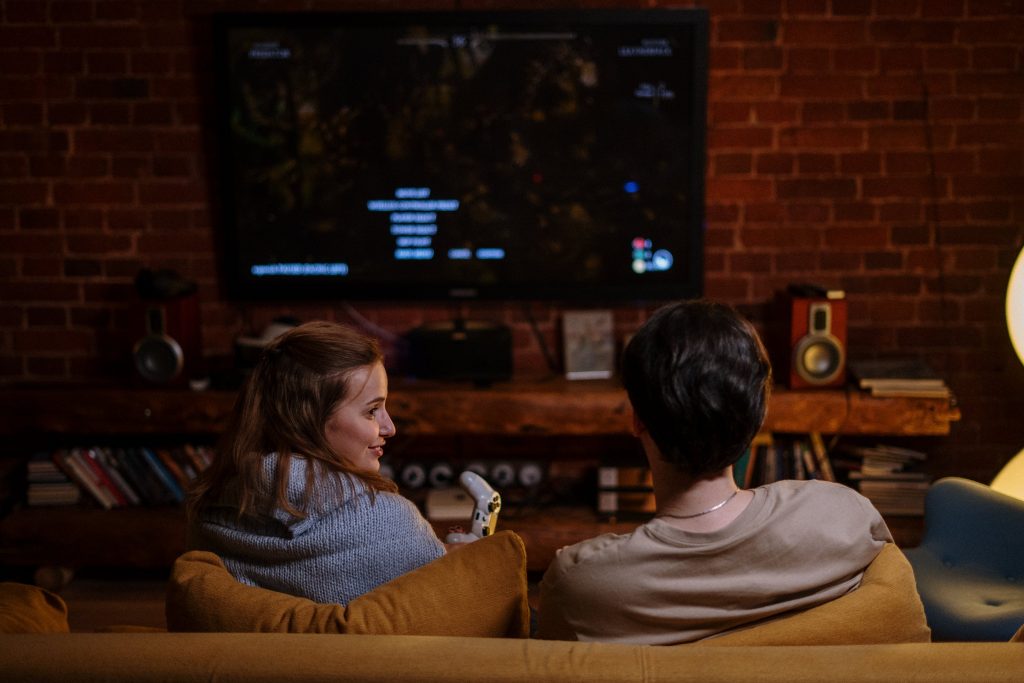 a couple is playing on TV